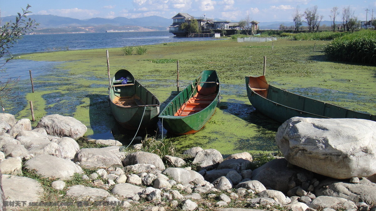 云南风景 湖水 石头 蓝天 树枝 木船 自然风景 旅游摄影