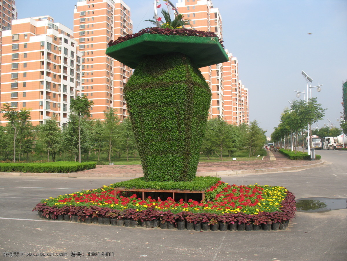 菏泽 一角 雕塑 花草 楼 树 天空 菏泽街景 风景 生活 旅游餐饮